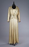 Lot 70 - A gold lamevening gown and jacket bearing...