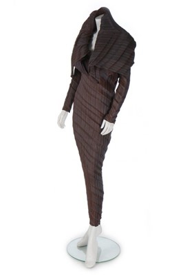 Lot 197 - An Issey Miyake pleated shot pink-brown dress,...