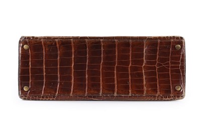 Lot 7 - An Hermès brown crocodile Kelly bag, 1962,...