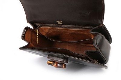 Lot 8 - A Gucci handbag with bamboo handle, 1960s,...