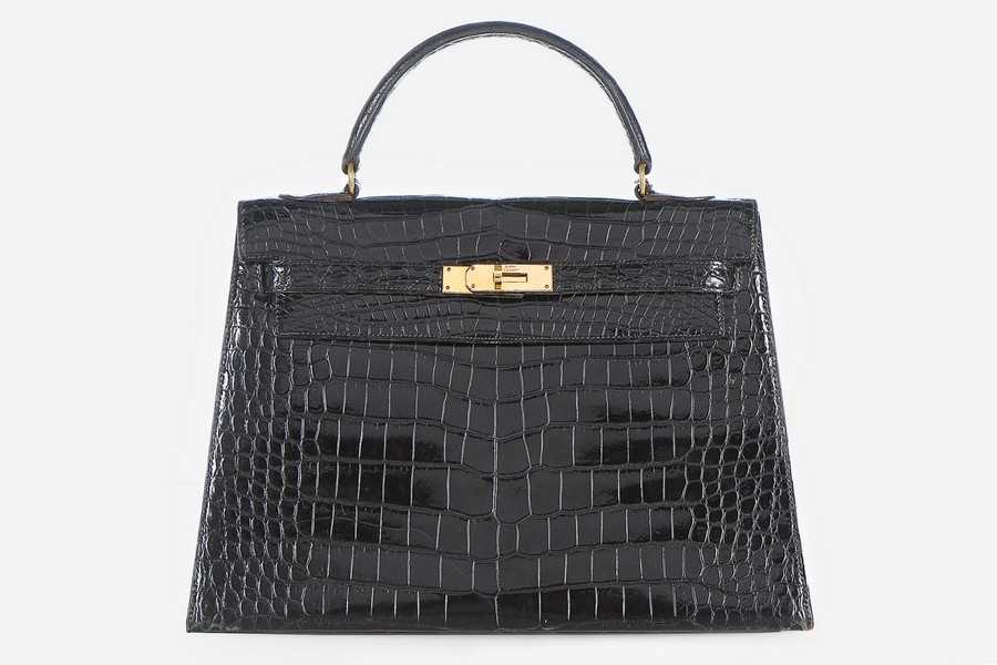 Lot 12 - An Hermès black crocodile Kelly bag, circa...