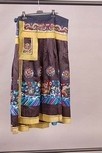 Lot 175 - An embroidered navy satin formal skirt, early...