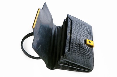 Lot 3 - An Hermès black crocodile handbag, 1960s,...