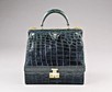 Lot 11 - An Hermès peacock blue crocodile mallette,...