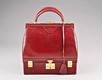 Lot 16 - An Hermès-red leather Mallette handbag,...