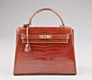 Lot 4 - A fine Hermès brown crocodile Kelly bag, late...