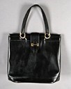 Lot 30 - An Hermès grained black leather `Berry' bag,...