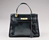 Lot 6 - An Hermès navy leather soft Kelly bag, 1960s,...