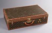 Lot 51 - A Louis Vuitton suitcase, French, 20th century,...