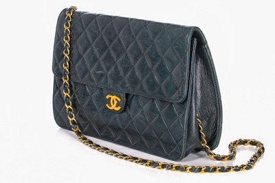 Lot 1 - A Chanel navy quilted lambskin leather flap...