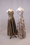 Lot 236 - Four 1950s ballgowns, comprising: black lace...