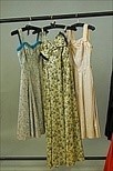 Lot 289 - A group of 1950s evening/dinner wear, eighteen...