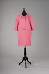 Lot 255 - A Givenchy pink wool coat, circa 1960,...