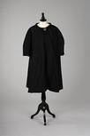 Lot 248 - A Givenchy black silk taffeta evening coat,...