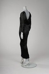 Lot 308 - An Ian & Marcel black silk `Delphos' gown,...