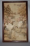 Lot 105 - An embroidered picture of cranes, Japanese,...