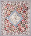 Lot 74 - A fine patchworked and embroidered quilt by...