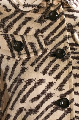 Lot 73 - An Emanuel Ungaro abstract-weave wool suit,...