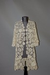 Lot 188 - An Irish crochet coat, circa 1912, hip-length,...