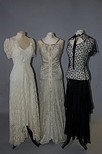 Lot 217 - Three 1930s evening gowns, the first of silver...