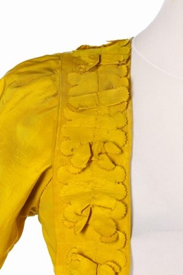 Lot 29 - A brilliant yellow silk open robe l'Anglaise,...