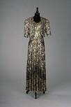 Lot 221 - A stylish gold sequinned evening gown and...