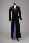 Lot 227 - A rare Schiaparelli black Linton tweed coat,...