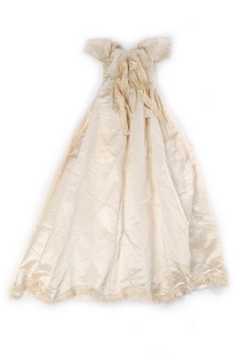 Lot 27 - A quilted ivory silk layette basket and...