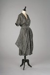 Lot 240 - An interesting grey damask silk dinner gown,...