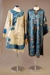 Lot 99 - Five Chinese robe, comprising: a brocaded...