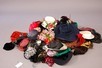 Lot 114 - A large group of hats/bonnets, 1920s-60s,...