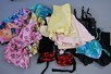 Lot 119 - A group of corsets, girdles and swim-wear,...