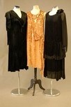 Lot 122 - Three cut-velvet flapper gowns, mid 1920s,...