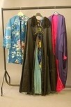 Lot 147 - A group of 1930s jackets, coats and capes,...