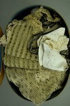 Lot 188 - An interesting group of fabrics, lace,...