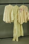 Lot 194 - An early 1920s swimming costume, of blue...