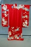 Lot 25 - A Japanese kimono, 20th century, with damask...