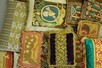 Lot 80 - A group of smaller cushions, the fabrics from...