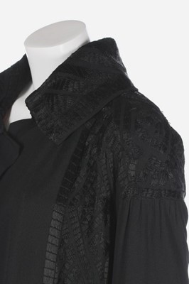 Lot 67 - A Jean Patou embroidered black crêpe coat,...