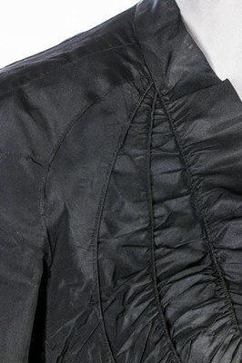 Lot 68 - A Schiaparelli couture black faille evening...