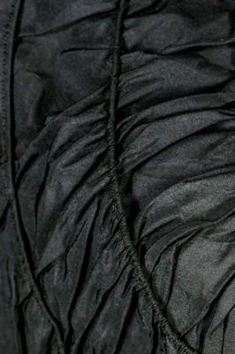 Lot 68 - A Schiaparelli couture black faille evening...