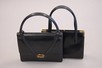 Lot 8 - Two Gucci black leather bags, 1960, gilt maker'...
