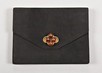Lot 78 - A fine Cartier black suede pochette, circa...