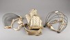 Lot 122 - Three wired bustles, 1870s-80s, comprising:...
