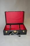 Lot 107 - An Hermès black leather suitcase/briefcase,...