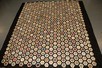 Lot 212 - A silk mosaic patchwork coverlet, circa 1850,...