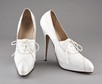Lot 103 - A pair of Vivienne Westwood 'nurse's' white...