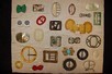 Lot 15 - A display board of assorted buckles, various...