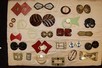 Lot 13 - A display board of assorted buckles, various...