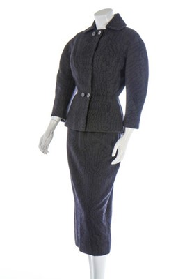 Lot 80 - A Jacques Fath couture grey wool suit, early...